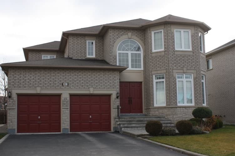 Before: the home with its original windows and doors